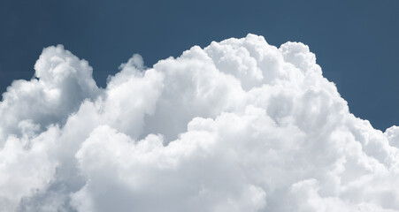 white fluffy clouds in the blue sky .blue sky background with tiny clouds