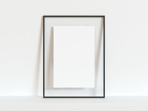 Vertical black thin empty frame mock up on white wall. 3d illustration.