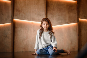 Fototapeta premium children, people, infancy and age concept - beautiful happy toddler girl over green lights background