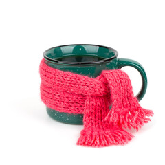 Mug of tea in a warm scarf