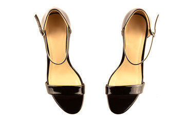 Women's black leather patent high-heeled sandals, isolated on a white background. The view from the top