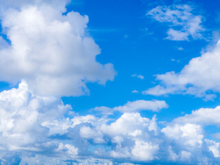 Obraz na płótnie Canvas blue sky with beautiful natural white clouds