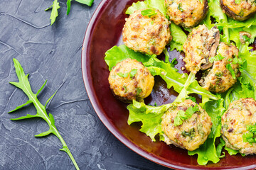 Mushrooms stuffed with minced meat.