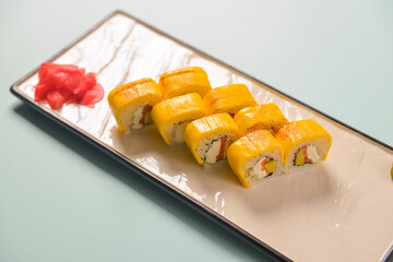 Sushi rolls philadelphia or california with cheddar and creame cheese, with tuna and avocado.