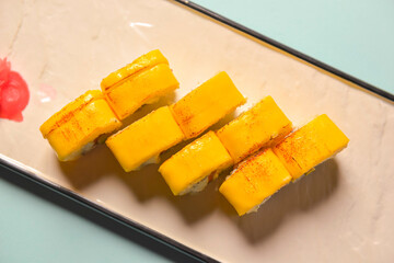 Sushi rolls philadelphia or california with cheddar and creame cheese, with tuna and avocado.