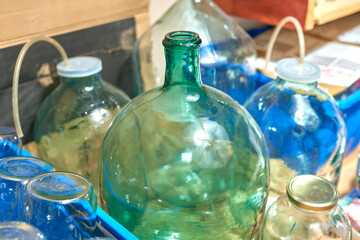 Old glass bottles and jars in the attic