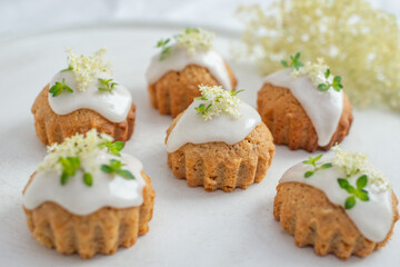 home made elderflower lemon cupcakes on a table