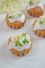 home made elderflower lemon cupcakes on a table