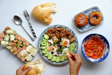 woman hand prepare food for breakfast, plate of omelet, cucumber non meat diet for healthy eating