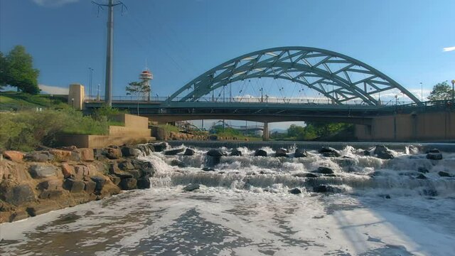 Aerial: South Platte River & Speer Blvd Bridge. Denver, Colorado, USA