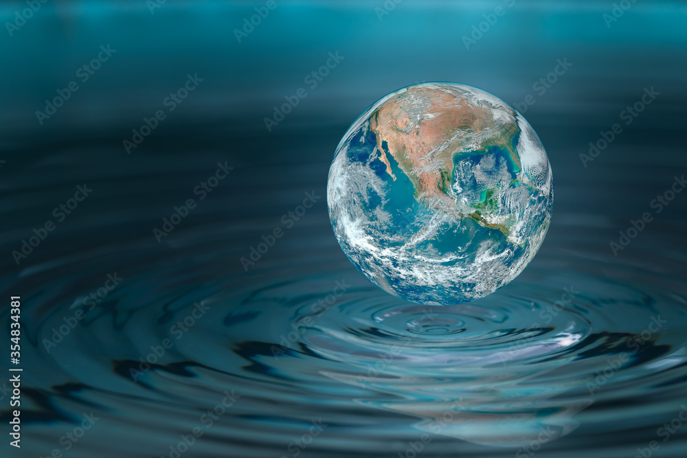 Wall mural world dropping in a water drop ,concept for water pullation and conservative.elements of this image 