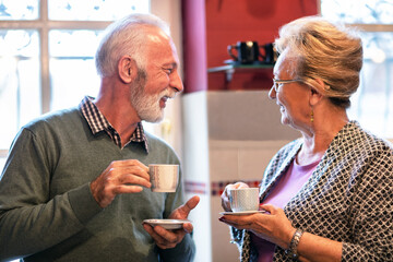 Elderly couple having a tea