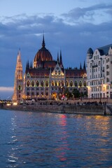Landscape view of Hungarian Parliament Building (Országház) on the Danube during sundown