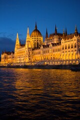 Fototapeta na wymiar Hungarian Parliament Building (Országház) on the Danube at sunset 