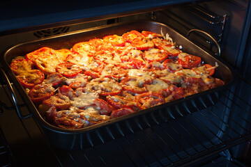 Dish of vegetables and cheese cooked in the oven