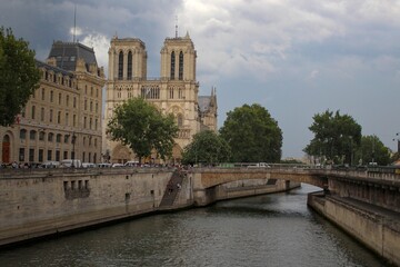 Fototapeta na wymiar Notre dame de Paris and Seine river in Paris, France