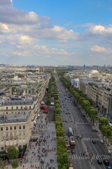 Beautiful, dark, calm photo of Paris avenues and boulevards taken at sunset from the Arc de Triomphe