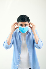 Man wearing an anti virus protection mask to prevent others from corona COVID-19 and SARS cov 2 infection