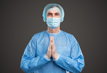 Medical practitioner praying during work