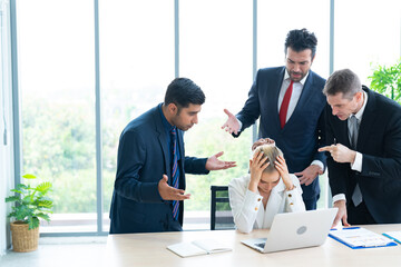 Male colleagues pointing fingers at upset female boss on meeting, tired sad woman leader...