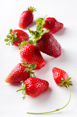 Vertical image.Fresh tasty strawberries.Summer harvest of fruits