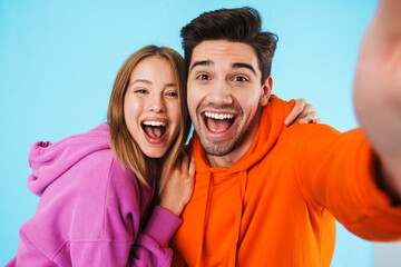 Portrait of a young couple wearing hoodies