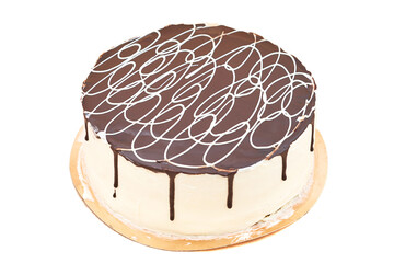 Round cake souffle, covered with chocolate glaze. Close-up on white background