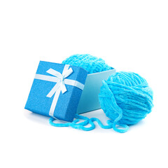 Gift blue box with a ball of yarn
