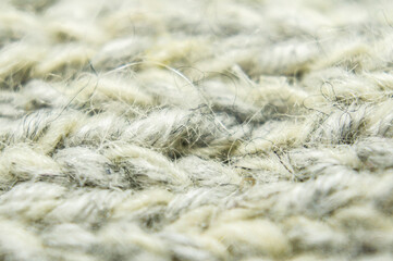 Large-knitted sheep wool close-up. Macro photography