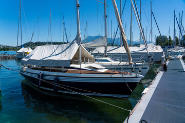 Fototapeta premium Wooden sailing boat firmly anchored in the boatyard.