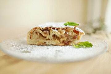 apple strudel with icing sugar