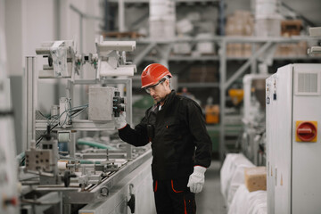 Portrait of worker in factory.