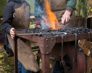 At the blacksmith. Fire. Hammer. Coal. Anvil. Maatschappij van Weldadigheid Frederiksoord Drenthe Netherlands