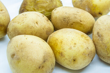 Boiled large yellow potatoes close-up