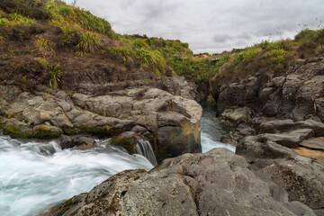 The Mahuia Rapids in the Tongariro National Park, New Zealand, cascading through a rock gorge