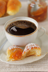 Mini sweet buns filled with orange jam and coffee