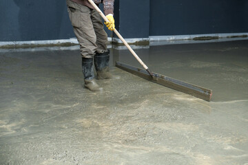 builders poured concrete at the construction site