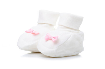 Fototapeta na wymiar White socks baby's bootees for newborn child baby on white baclground isolation