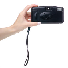 Old film photo camera in hand on white background isolation