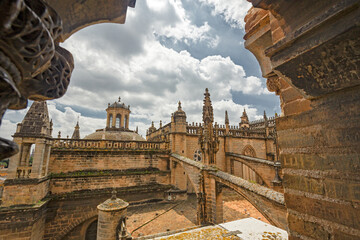 Obraz premium Panoramic view of the buttresses of the Gothic roof of the cathedral Seville, Spain.