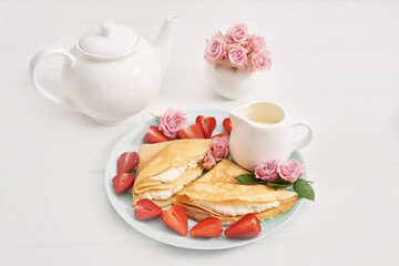 Strawberries and pancakes. Pancakes with strawberries. Romantic breakfast. Valentine's Day. Greeting Card Mother's Day. Breakfast in hotel room. Maslenitsa. Pancake week. Women's Day Congratulation