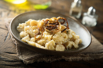 Traditional German noodles with cheese and fried onion