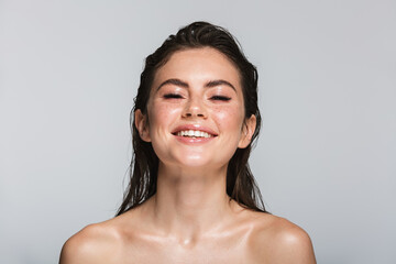 Beauty portrait of an attractive young topless brunette woman