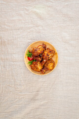 delicious fried chicken wings with sauce