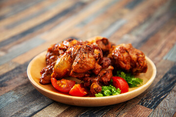 delicious fried chicken wings with sauce