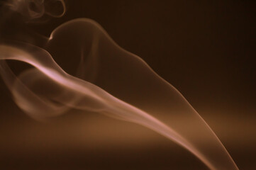 Smoke scented candles on a black background