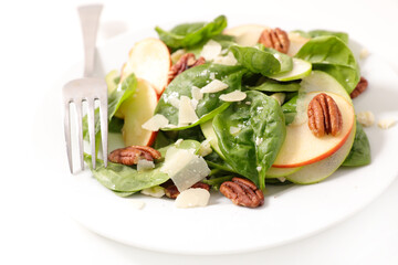 spinach with apple, cheese and pecan nut