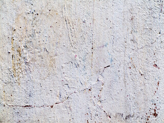 Concrete, weathered, worn, painted white. Landscape style. Grungy Concrete Surface. Great background or texture.