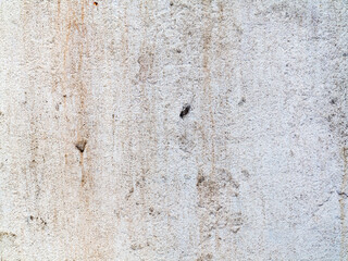Concrete, weathered, worn, painted white. Landscape style. Grungy Concrete Surface. Great background or texture.