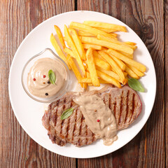 fried beefsteak with pepper sauce and french fries
